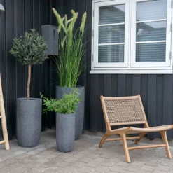 House Nordic Derby Stuhl: Natürliches Poly-Rattan mit Teakholzbeinen